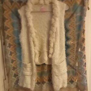 This Feels Like Rabbits Fur Im Not Sure That It Is Though.